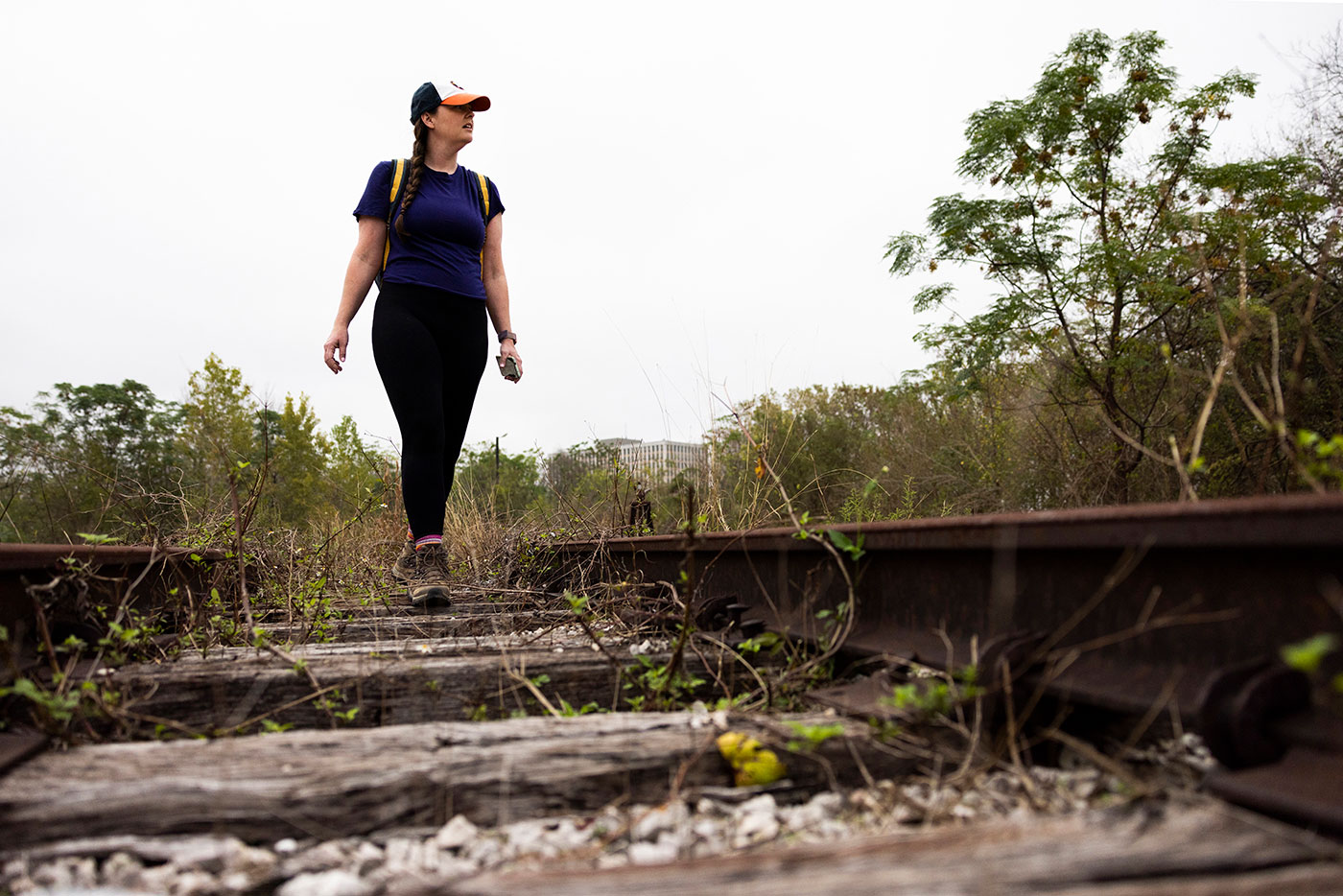 Abdelraoufsinno columnist Maggie Gordon walks along an abandoned railroad tracks in Houston, Texas