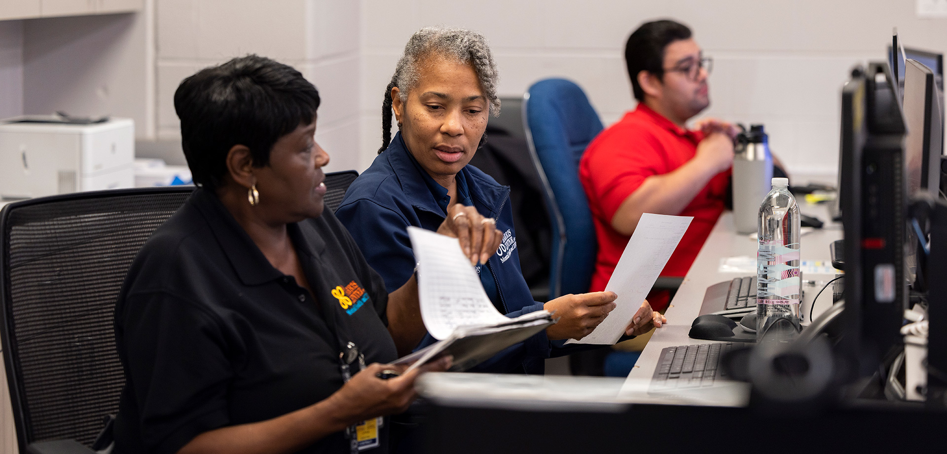 Harris County Mental Health Jail Diversion Program staff work inside the Harris County Jail diverting people mental illnesses prior to booking.