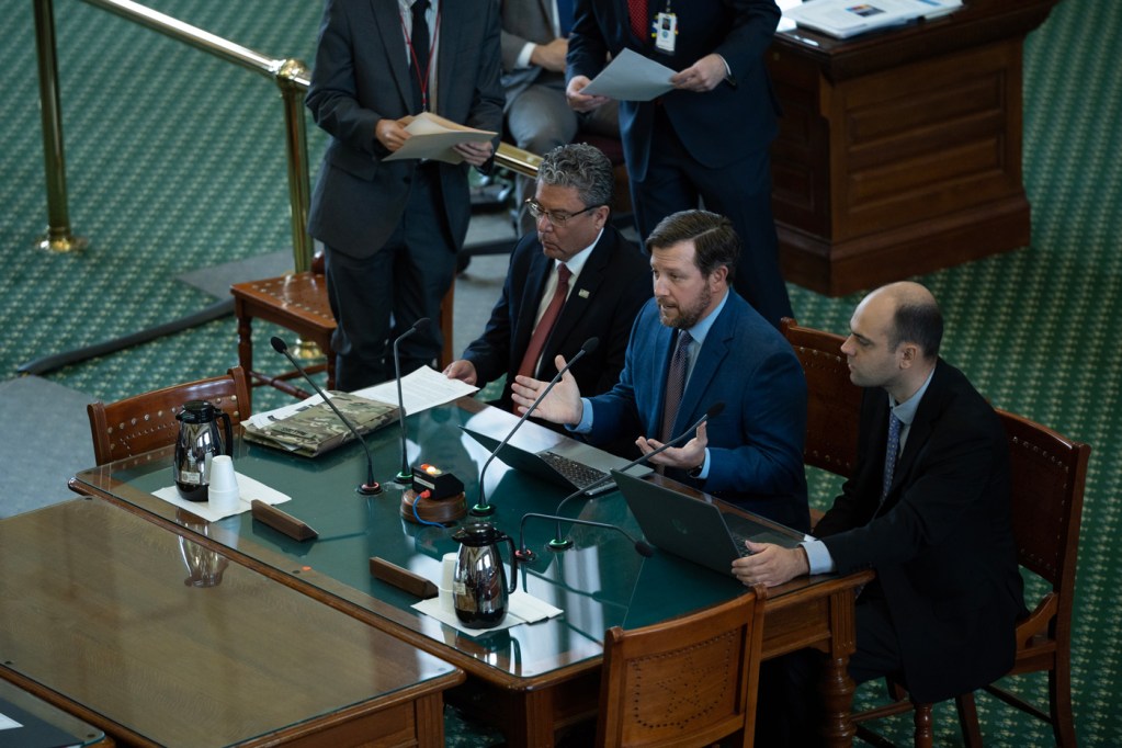 Lee Johnson, center, CEO of the Texas Council of Community Centers, speaks at a Texas Senate Health and Human Services Committee hearing on March 22, 2023, at the Texas Capitol in Austin.