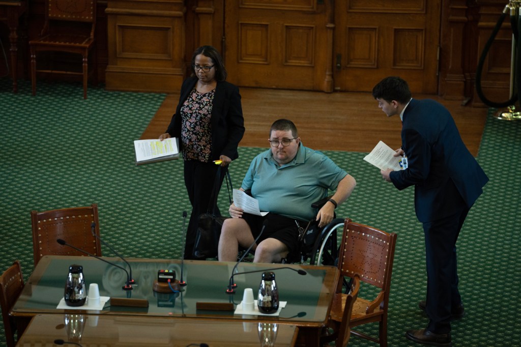 John Nicks, a Texas resident who struggles with mental illness, prepares to testify in the hearing for Senate Bill 26 in the Texas Senate Chambers on March, 22, 2023 in Austin.