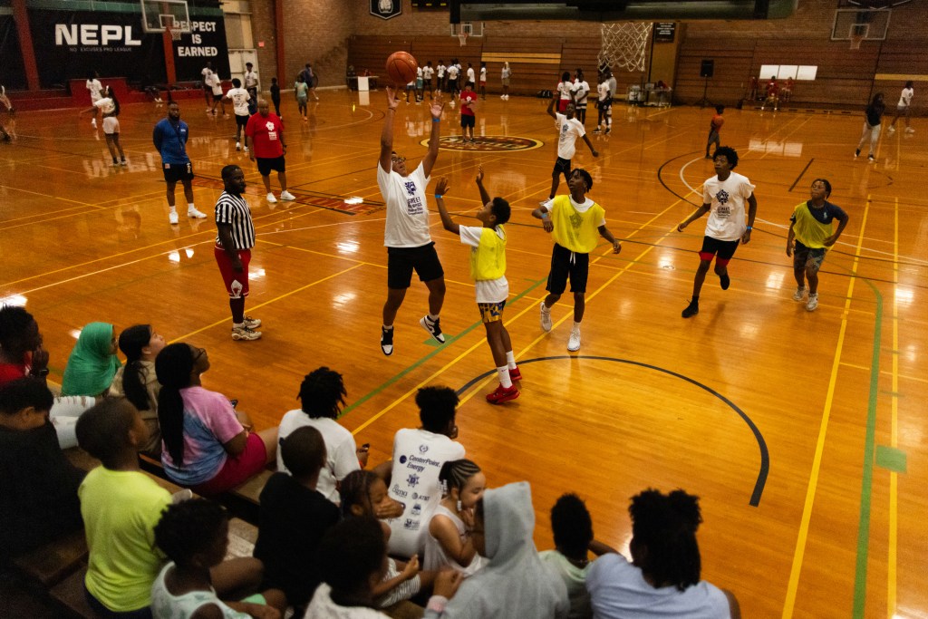 Children play basketball at a tournament in Houston