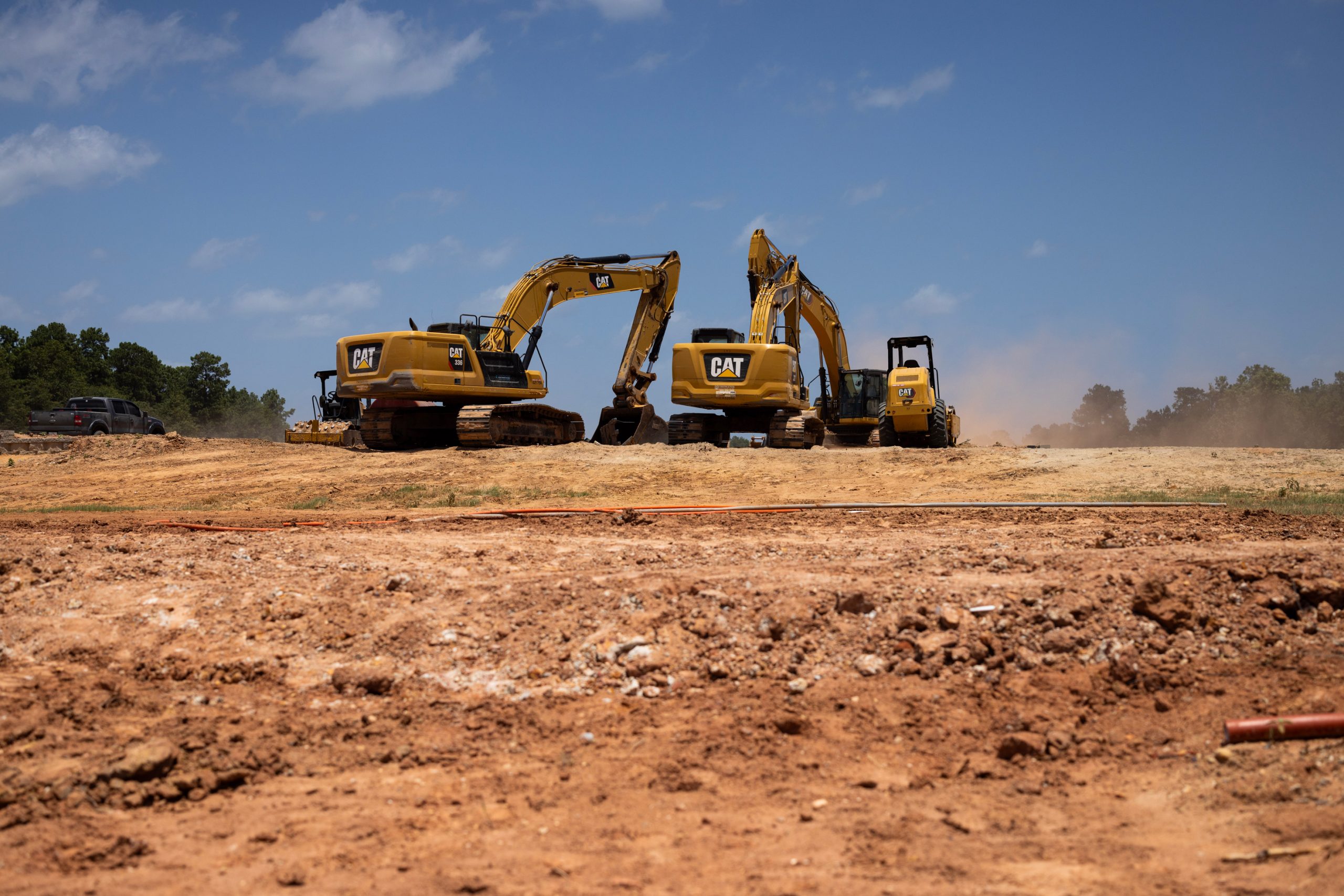 Excavators work on future housing developments at Chapel Run, Saturday, July 15, 2023, in Montgomery