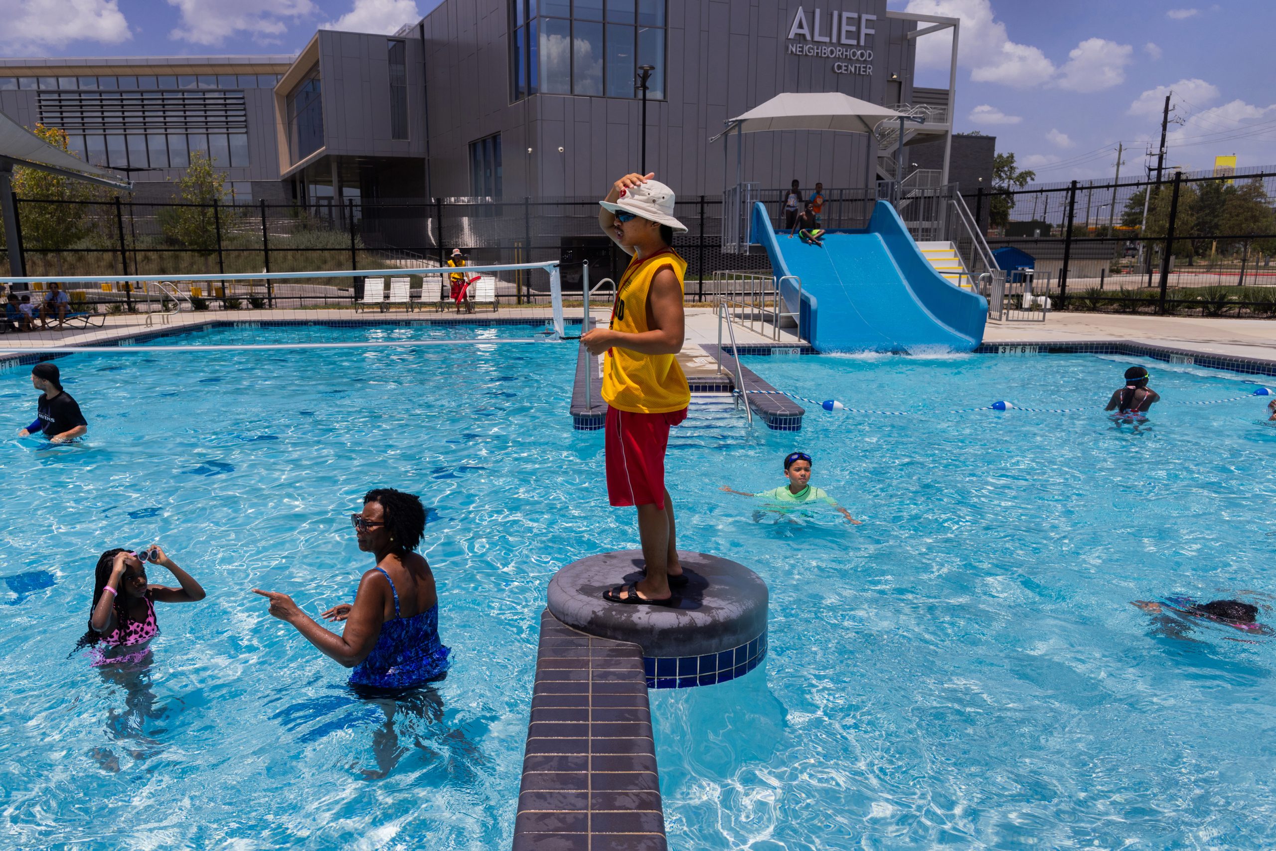 An Alief Neighborhood Center and Park pool lifeguard briefly removes bathers from the pool so the lifeguards can take a break