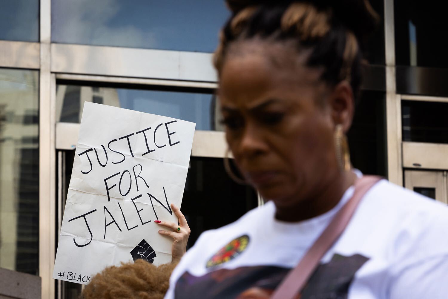 A sign demanding justice for Jalen Randle, the 29-year-old shot and killed by a Houston Police Department officer in April 2022, is displayed at a rally.
