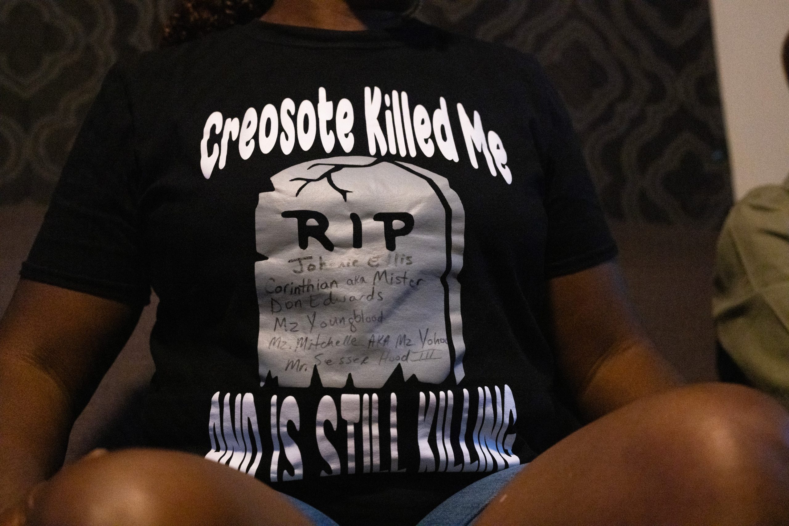 Sandra Edwards wears a shirt with “Creosote Killed Me” written on it as she gives an interview to ABC 13 about her reactions to a statement released by Union Pacific regarding contamination in Houston's Fifth Ward.