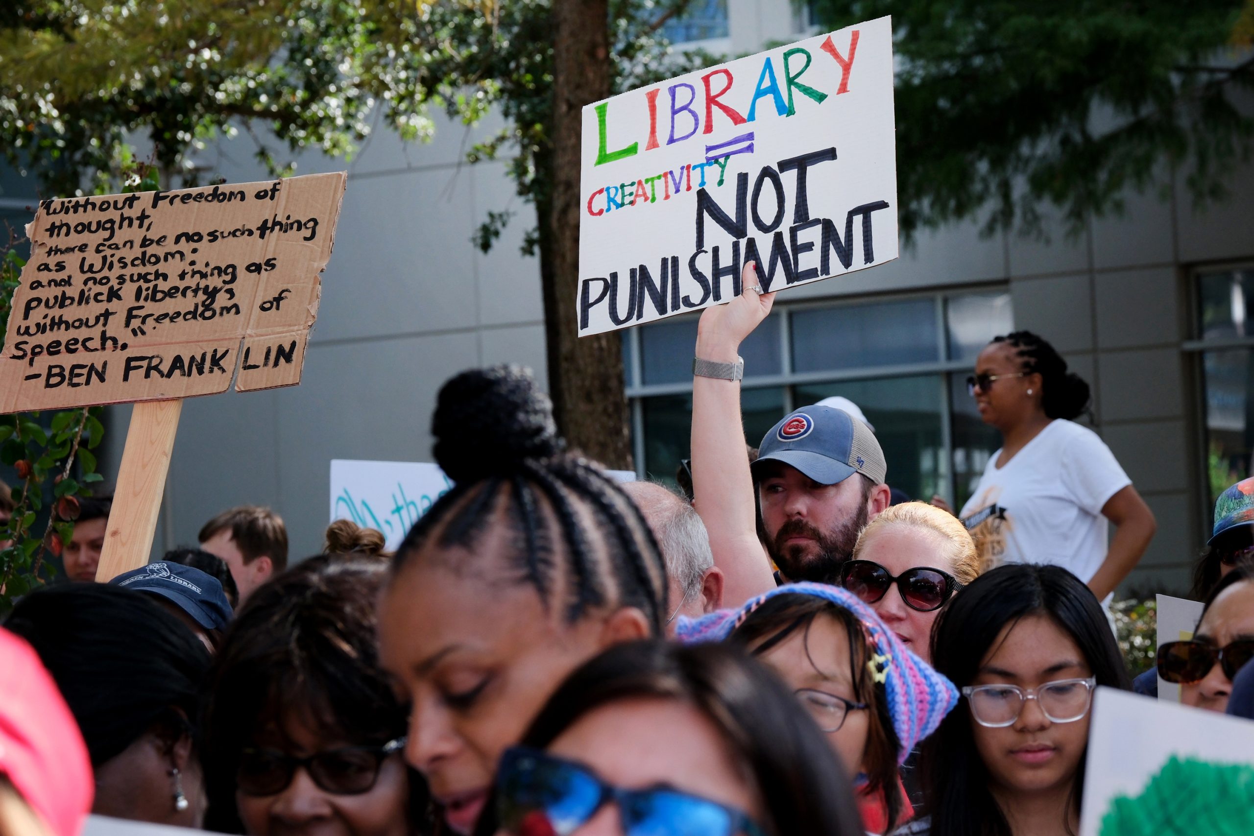 Demonstrators protest the decision by HISD Superintendent Mike Miles to turn some school libraries into discipline rooms.