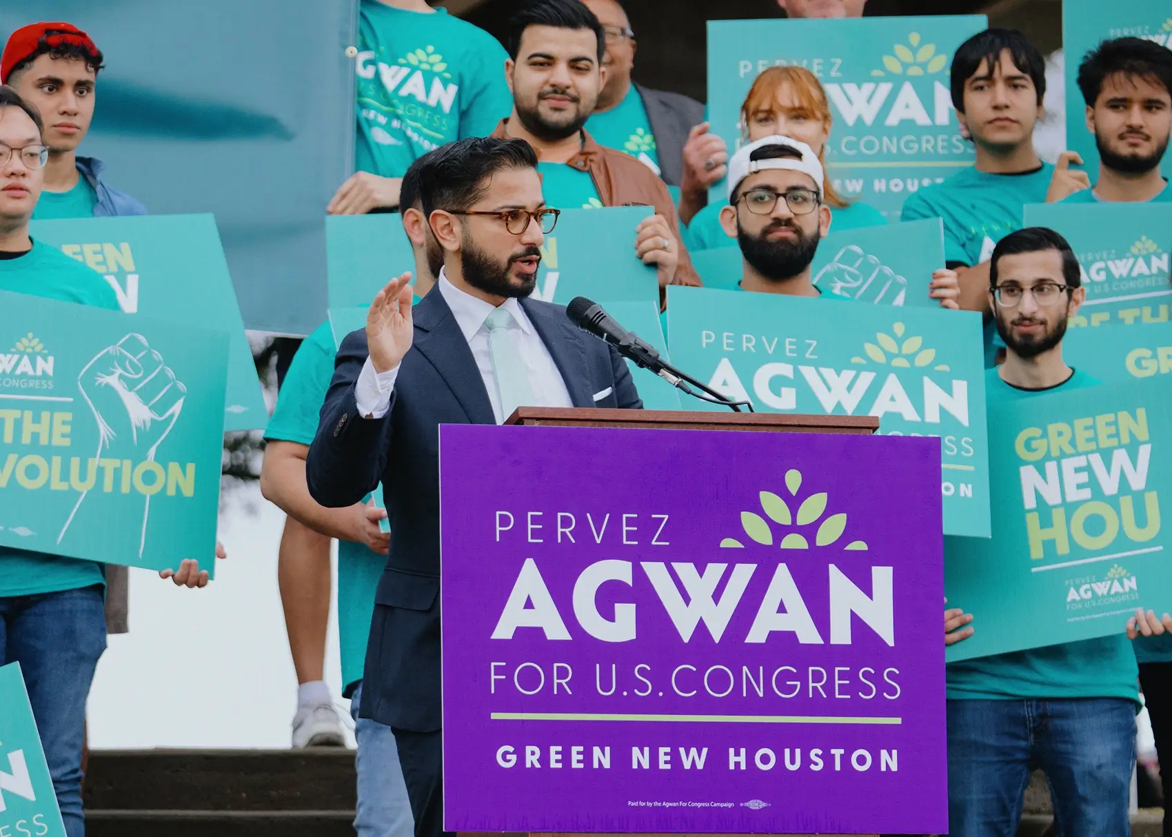 A lawsuit filed by a former campaign worker accuses congressional candidate Pervez Agwan of assault, battery and false imprisonment. Agwan is pictured at a campaign rally.